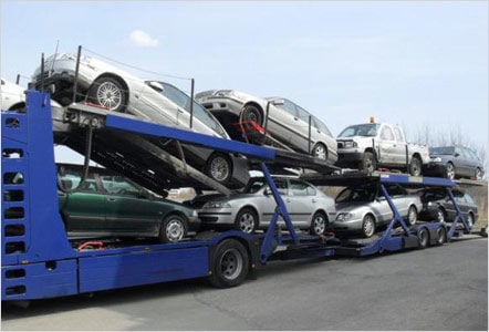 auto transport carrier full of cars