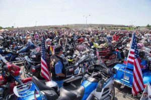 Group of bikers in parking lot at rolling thunder rally