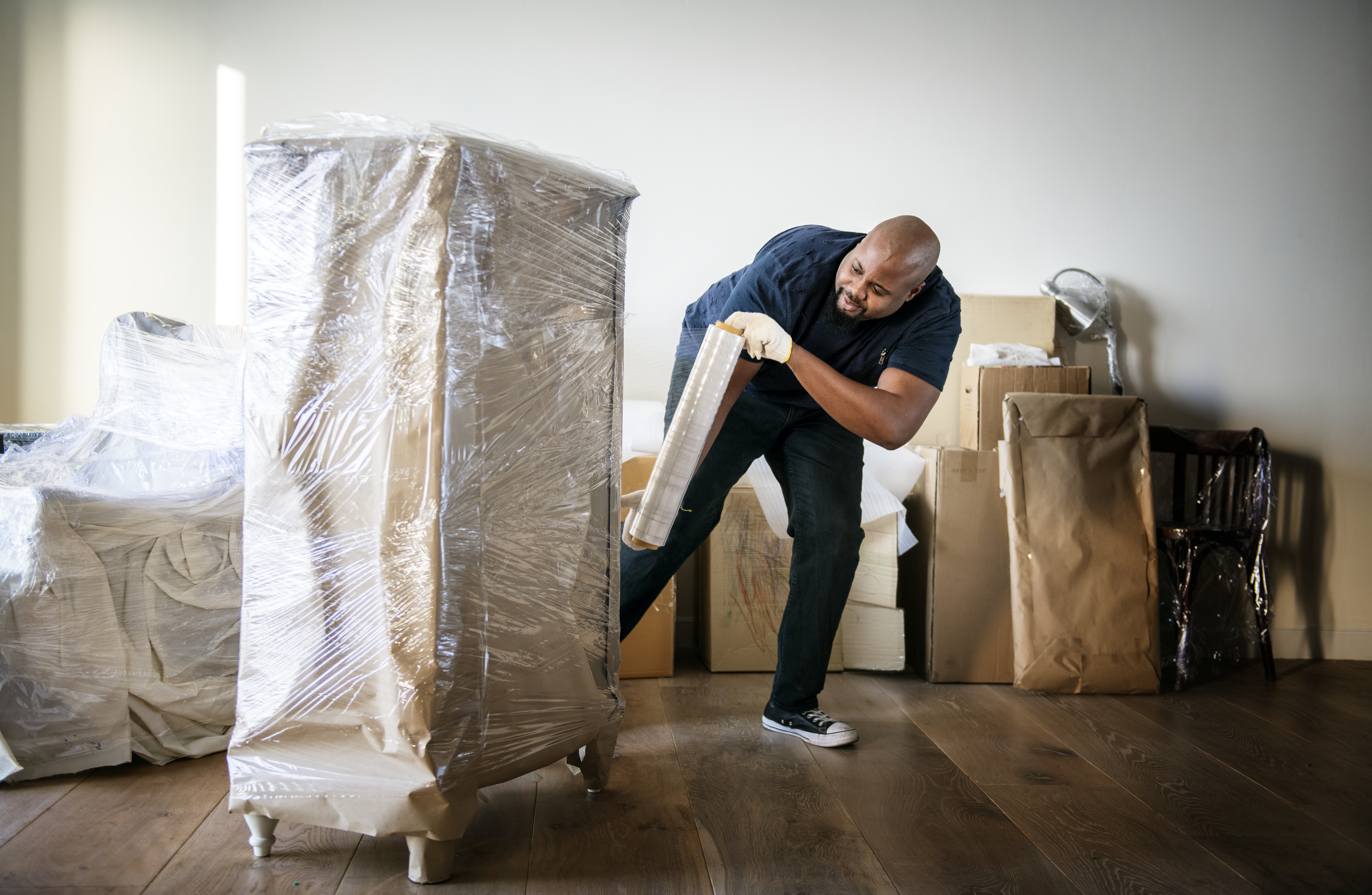man moving furniture