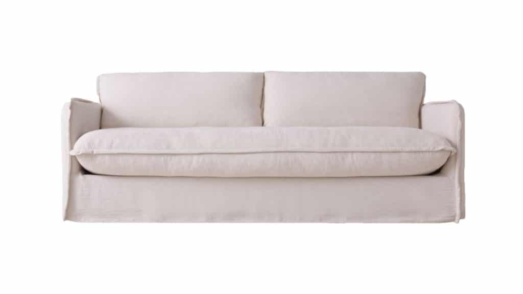 white sofa with single seat cushion