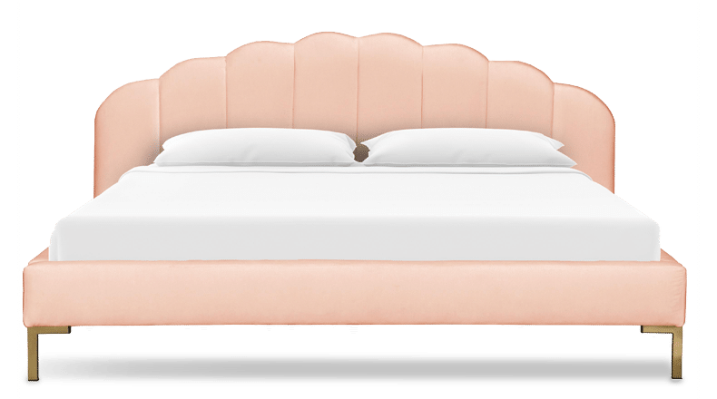pink velvet platform bed with seashell headboard from Chairish