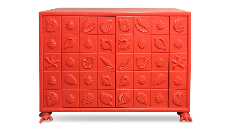 red tv cabinet with shell detail from Chairish