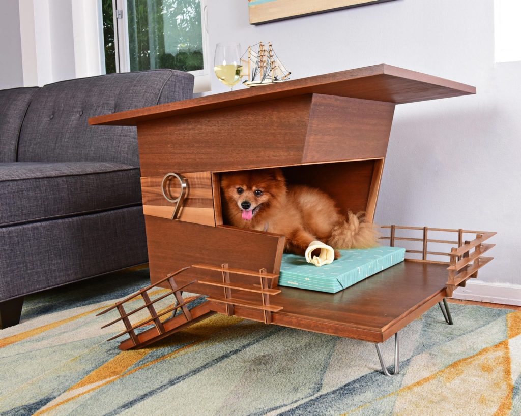 Pomeranian dog in mid-century modern dog house