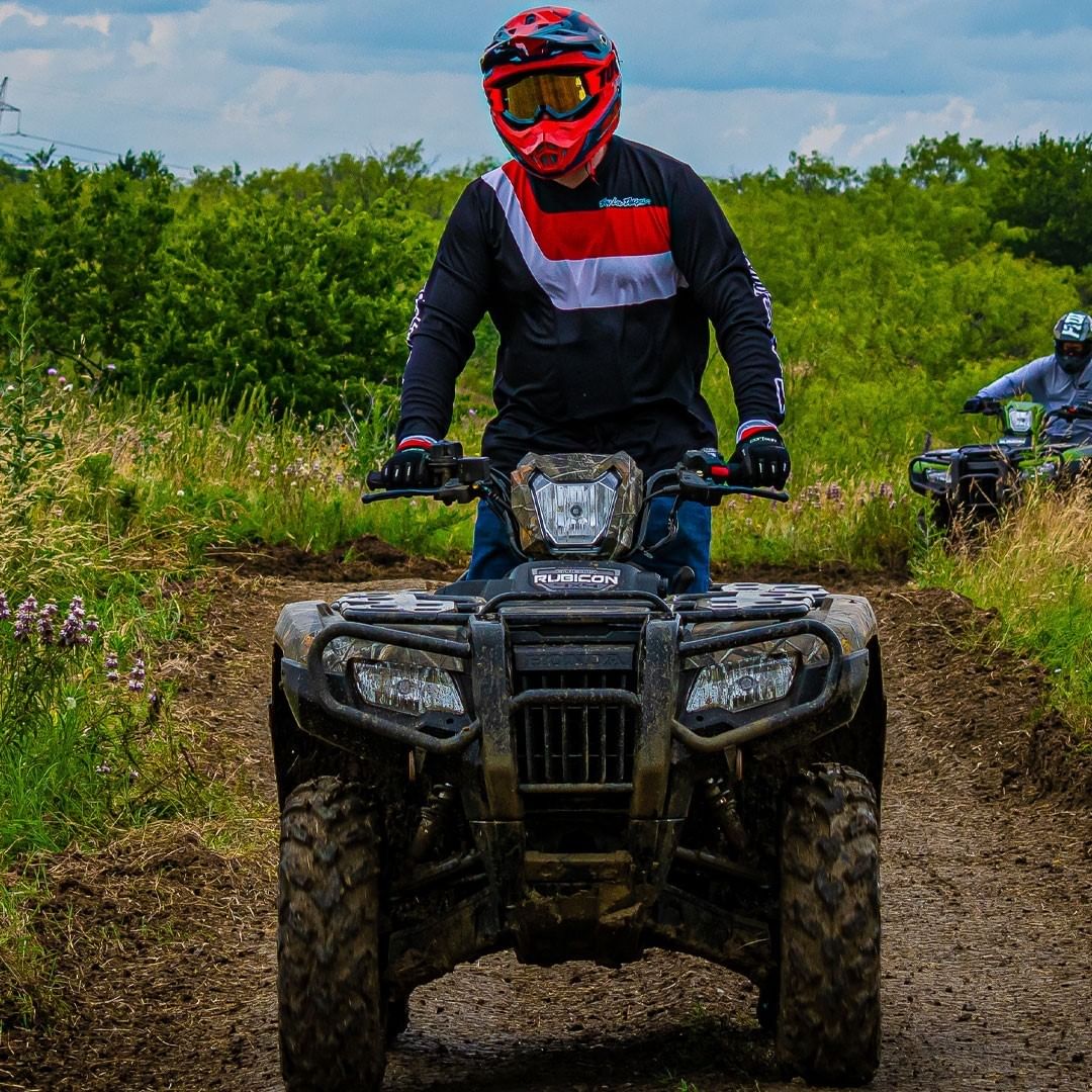 atv off road vehicle in the mud