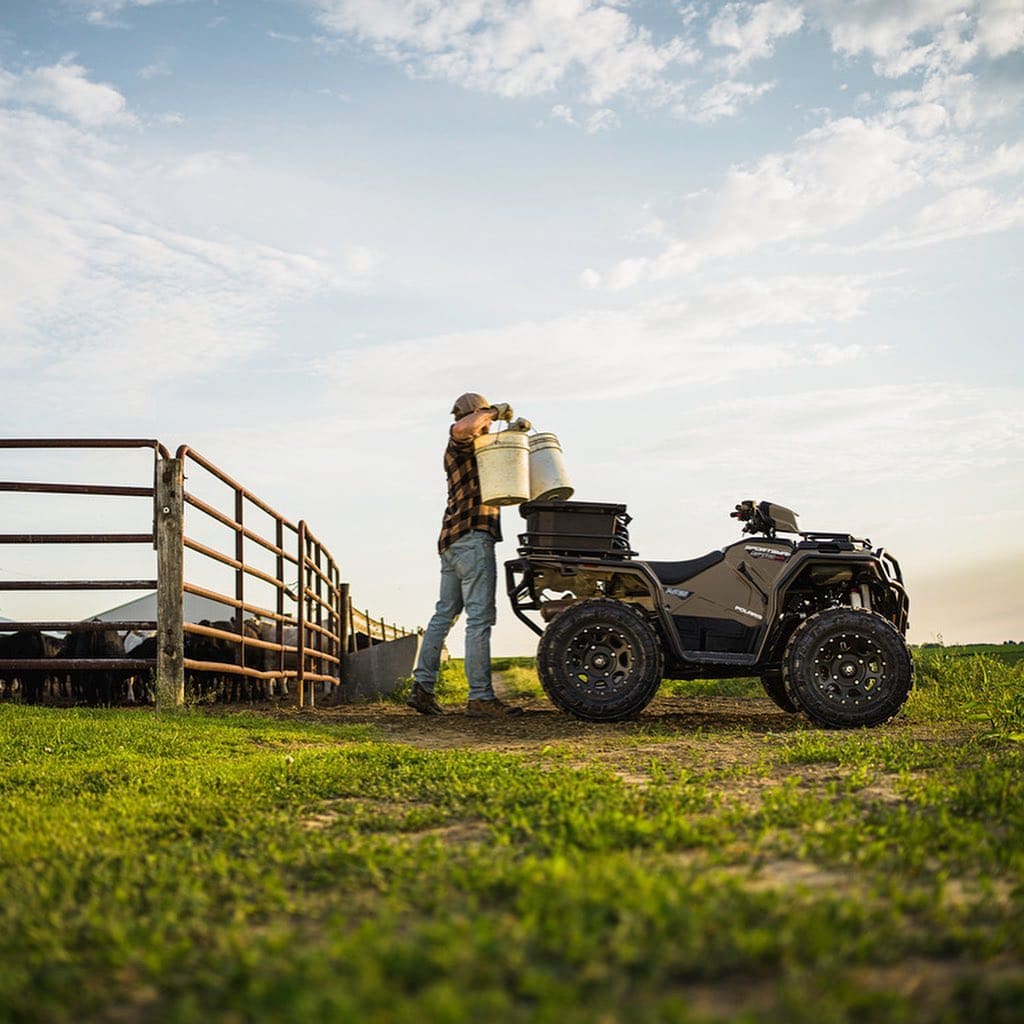 farmer loading up an atv