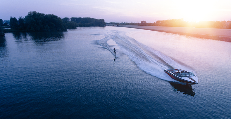 powerboat rental on lake at sunset