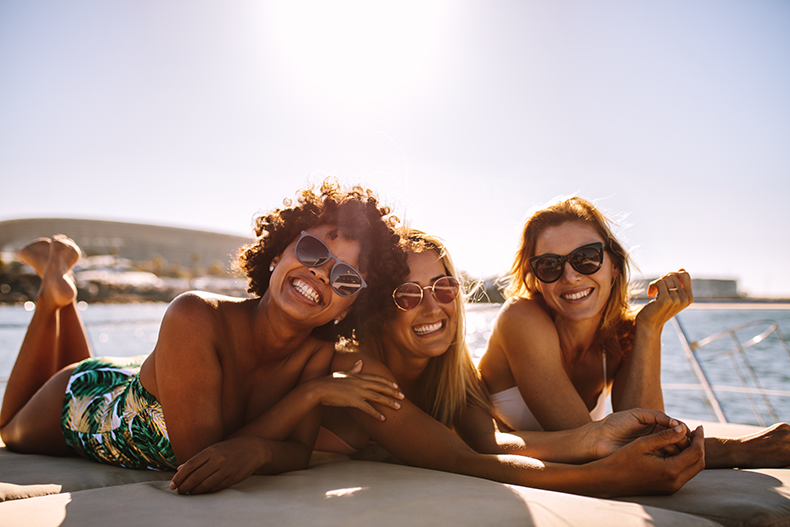 Three boat renters on a boat