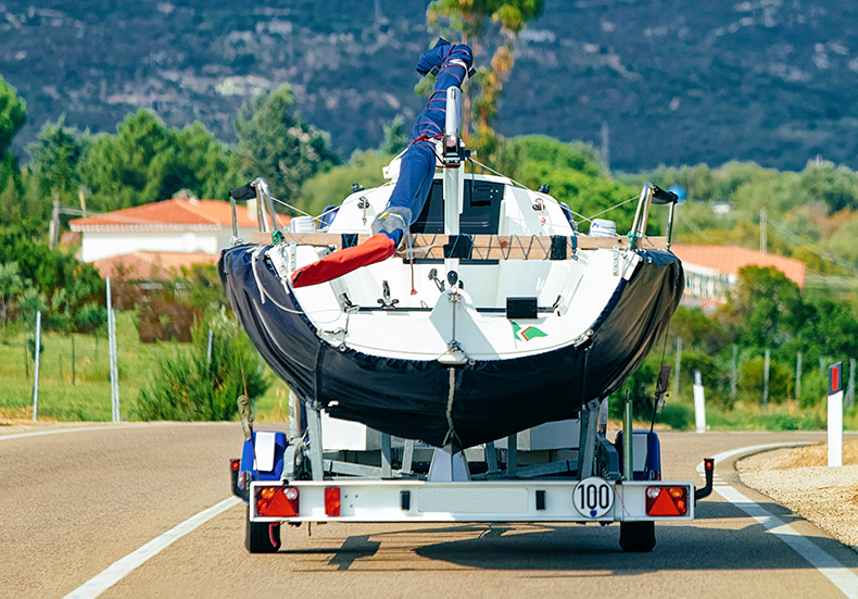 boat transporter towing a boat