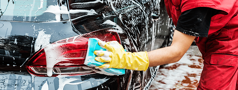 Example of someone washing and preparing their car for vehicle transport