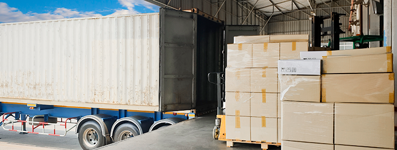 freight being loaded onto truck