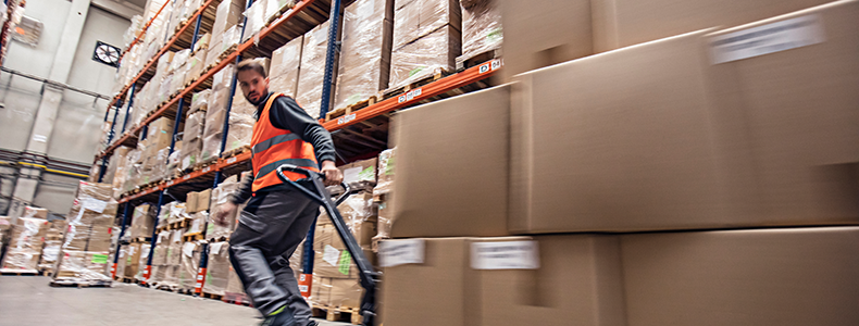 warehouse worker stocking freight delivery