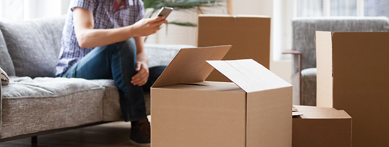 person with boxes