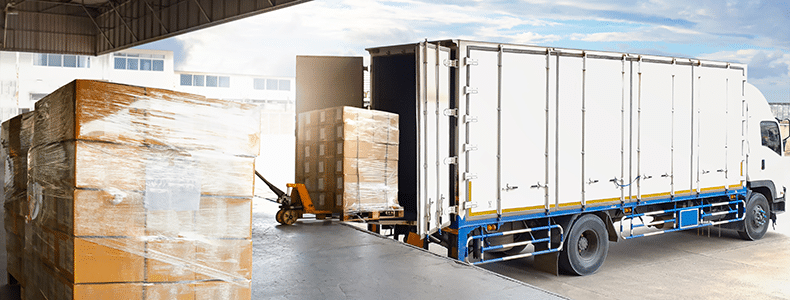 truck being loaded with palletized boxes for LTL shipping
