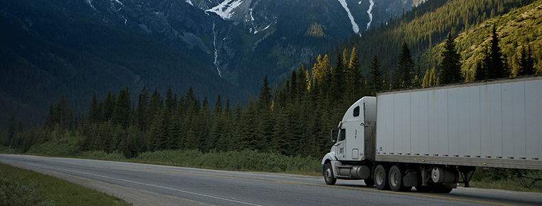 truck on open mountain road fulfilling ltl shipping