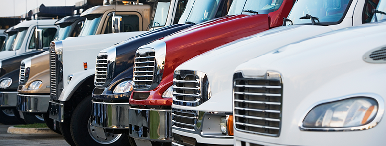 row of ltl freight trucks