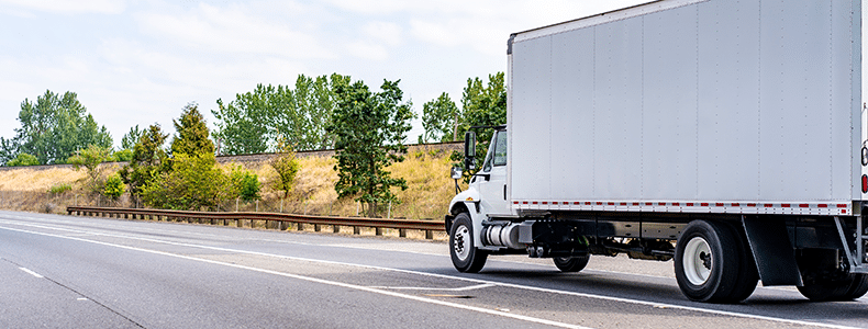 moving truck on open road