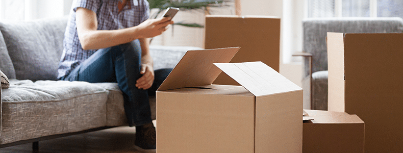 person preparing for household goods international shipping