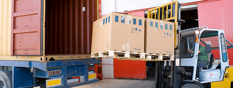freight being unloaded off truck after expedited shipping