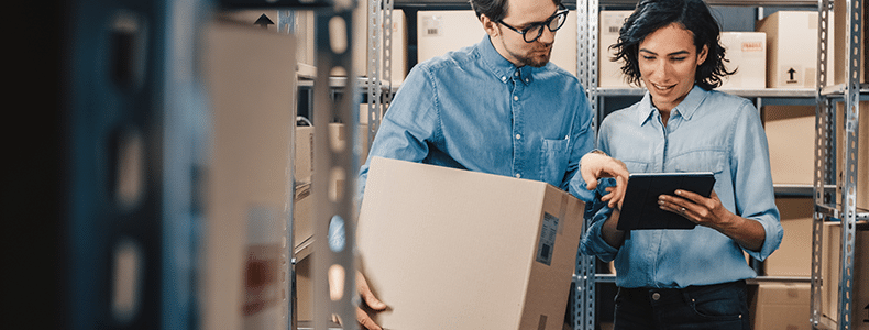 business shippers  in warehouse looking for expedited shipping services