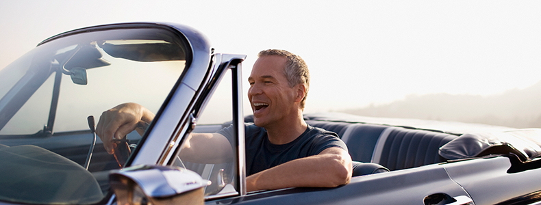 guy driving a car in california