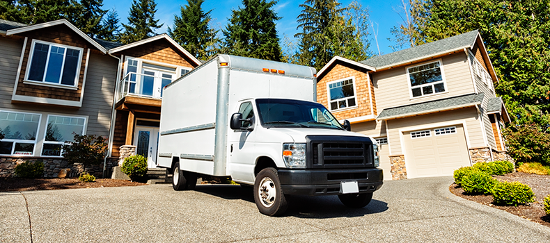 box truck in front of house