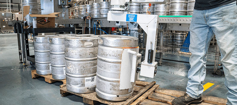 kegs of beer being palletized for shipping