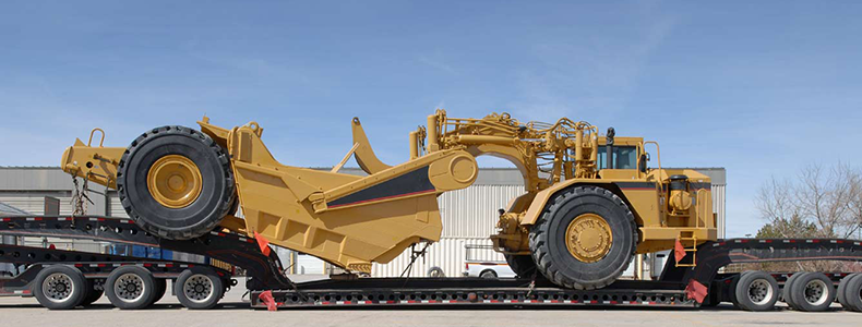 low boy trailer for how much does equipment hauling cost