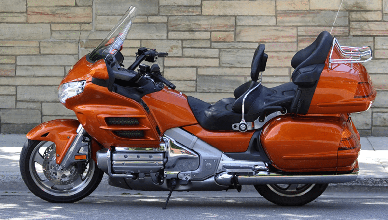 orange motorcycle ready for shipping