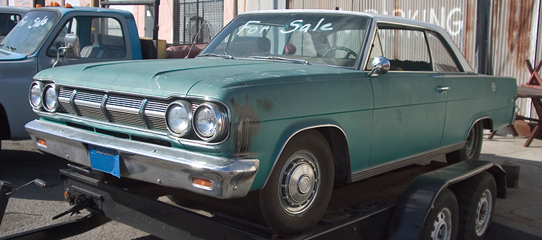 non-running vehicle on trailer