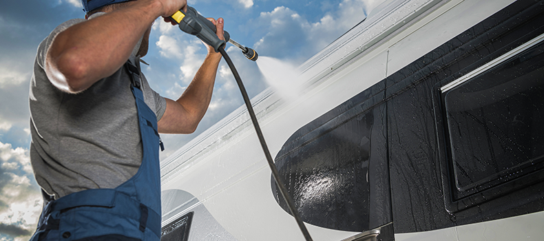 someone cleaning their RV for seasonal storage